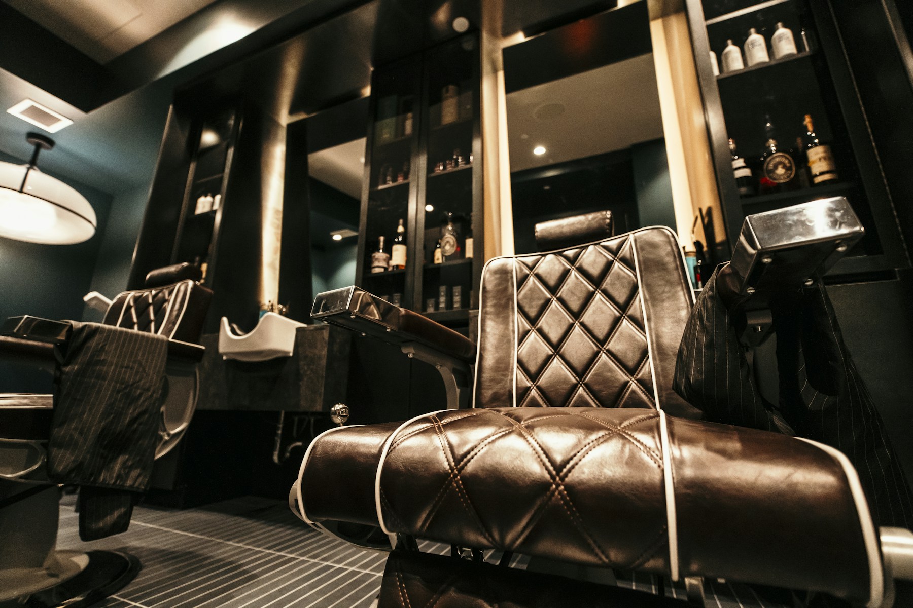 Leather barber chairs inside a contemporary barber studio